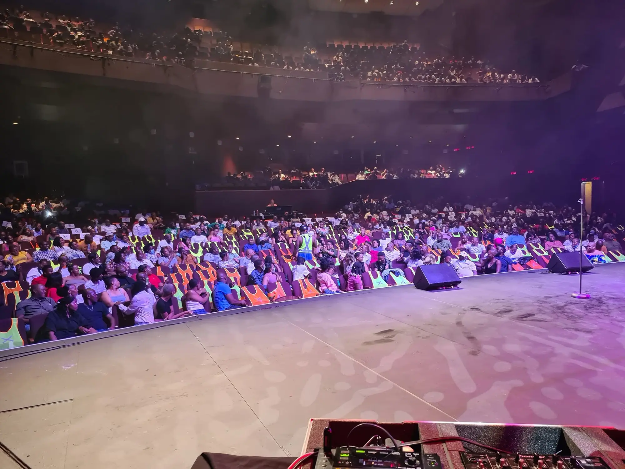 A packed arena, seen from the stage